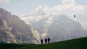 People walking a mountain trail